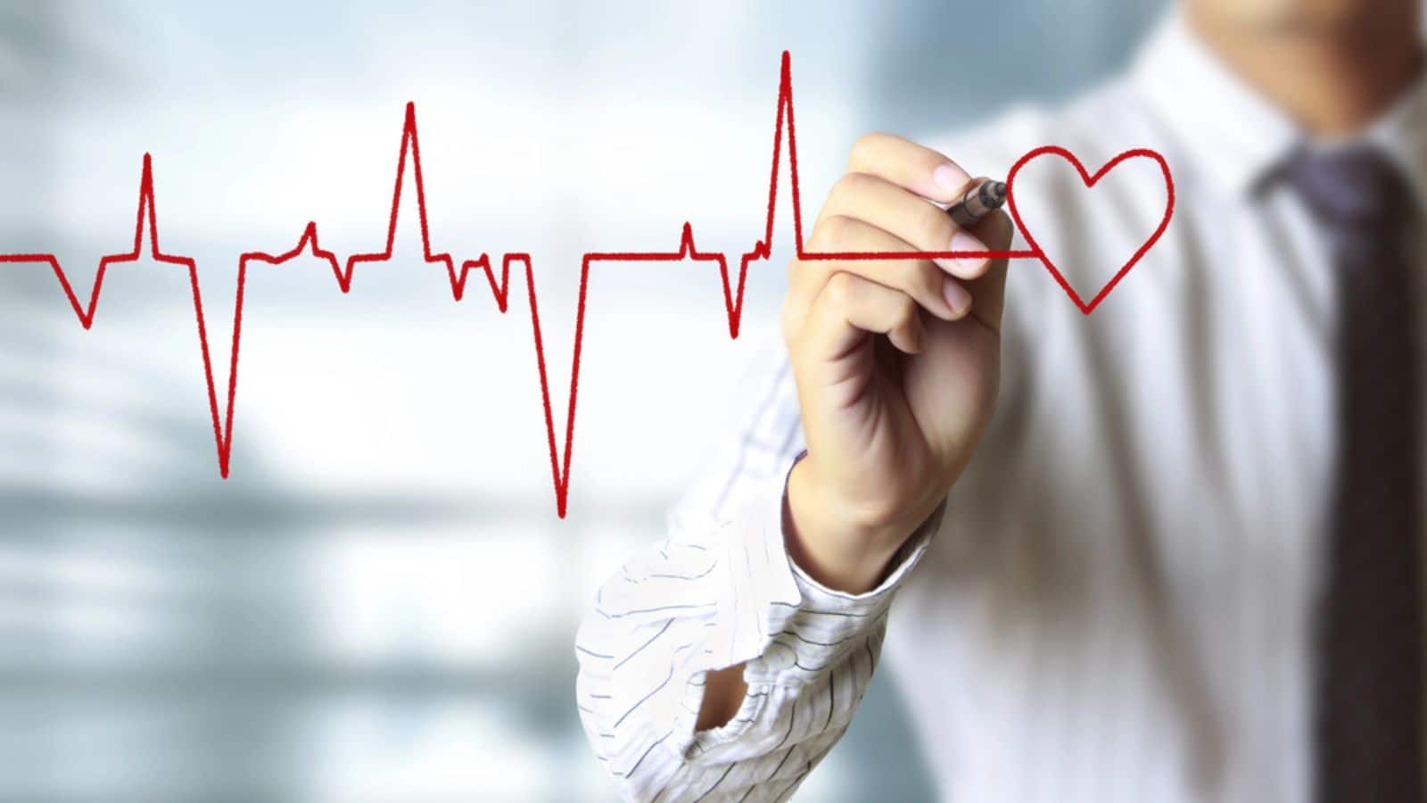 Man drawing chart heartbeat