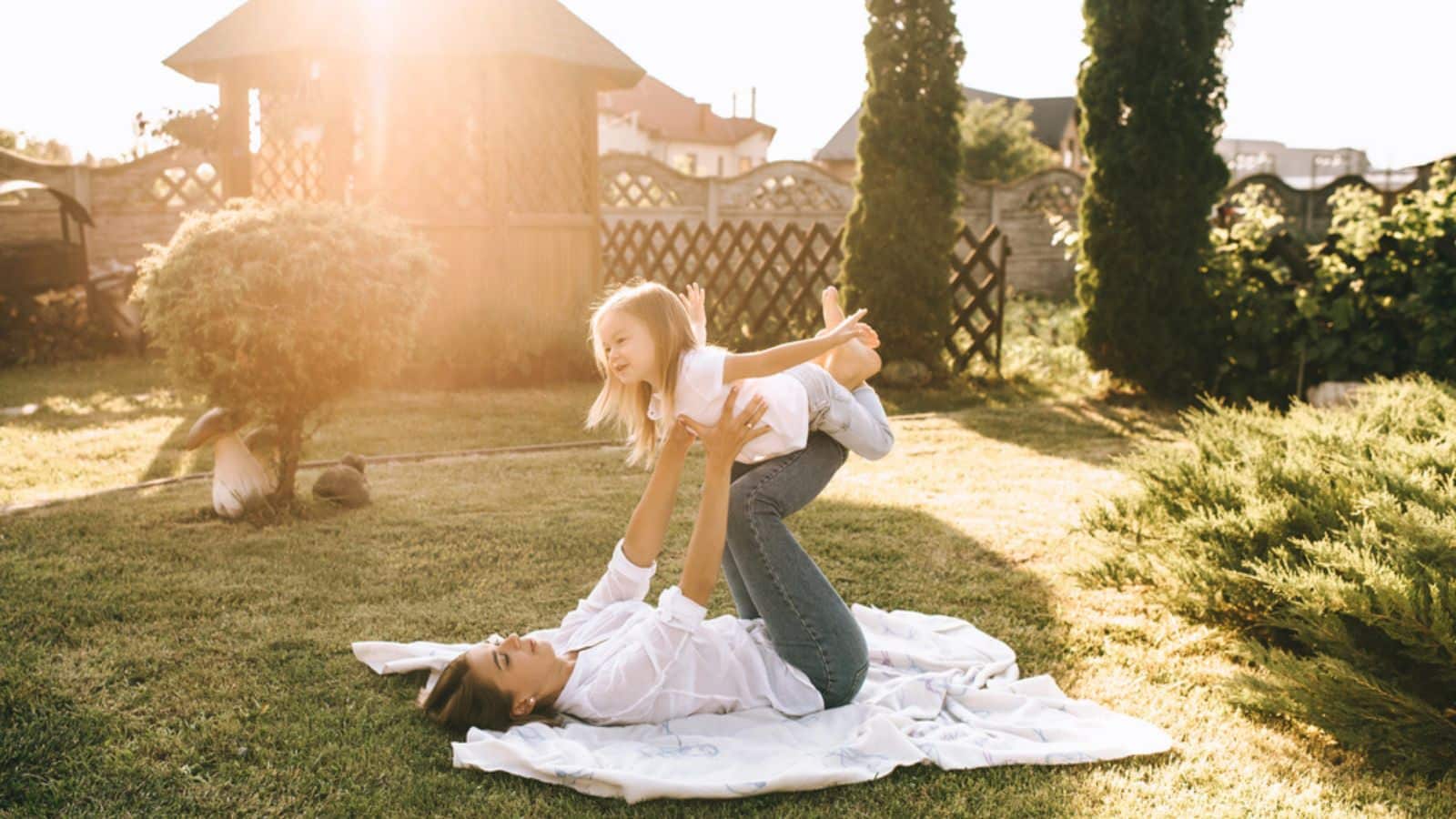 Mother and cute little daughter having fun together